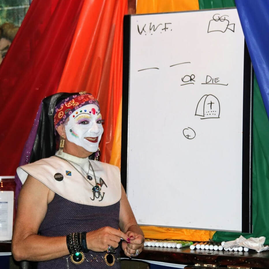 Color photo of Sister Ida Know of The San Diego Sisters of Perpetual Indulgence hosting Tiger's Pictionary at Number One Fifth Avenue in Hillcrest. Photo Credit: Dirk Kowalski