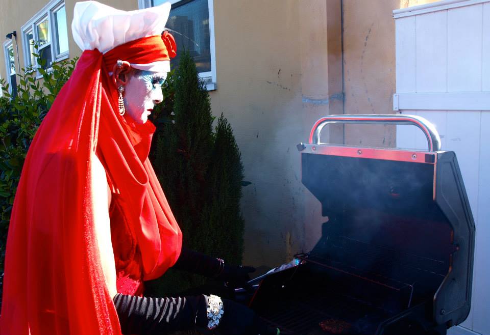 Sister Raven Lunatic of The San Diego Sisters of Perpetual Indulgence grilling at The Loft, 2014.